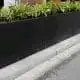 Montaje de 5 jardineras en color negro